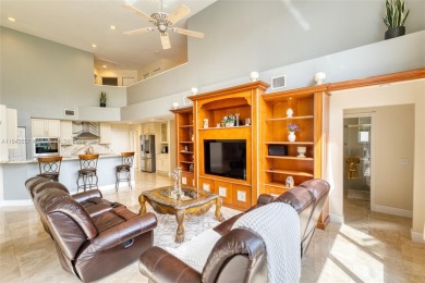 SPECTACULAR WATER VIEWS FROM 5 BED, 4 FULL BATH, POOL WITH on Heron Bay Golf Club in Florida - for sale on GolfHomes.com, golf home, golf lot