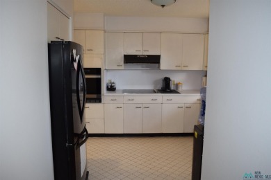 Welcome to this charming 2 bedroom, 2.5 bath brick condo on Chaparral Country Club in New Mexico - for sale on GolfHomes.com, golf home, golf lot