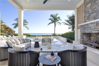 Gated West Indies inspired 5 BD, 2 story smart home with 5.4 BA on Moorings Golf Club in Florida - for sale on GolfHomes.com, golf home, golf lot