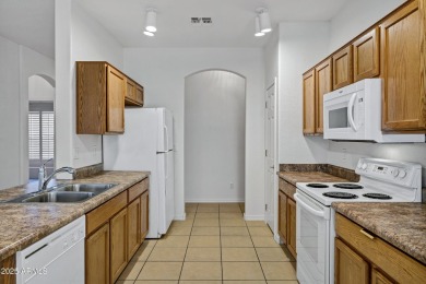 Refreshed 2-bedroom, 2-bathroom home with versatile den on Lone Tree Golf Club in Arizona - for sale on GolfHomes.com, golf home, golf lot