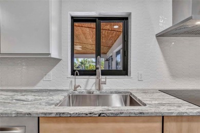 NEVER FLOODED! WOW-FACTOR WATERFRONT! Whole house luxury on Rotonda Golf and Country Club - Long Marsh  in Florida - for sale on GolfHomes.com, golf home, golf lot