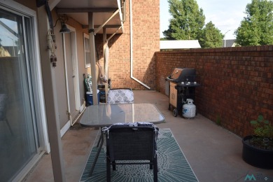 Welcome to this charming 2 bedroom, 2.5 bath brick condo on Chaparral Country Club in New Mexico - for sale on GolfHomes.com, golf home, golf lot