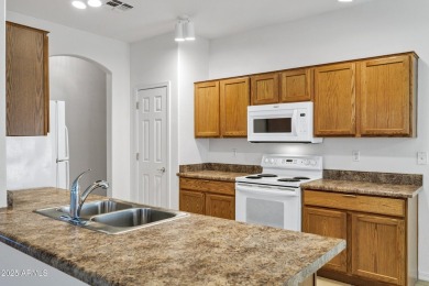 Refreshed 2-bedroom, 2-bathroom home with versatile den on Lone Tree Golf Club in Arizona - for sale on GolfHomes.com, golf home, golf lot