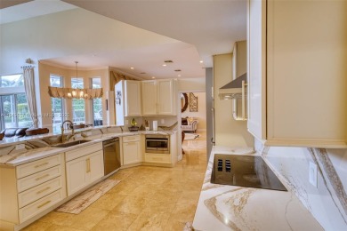 SPECTACULAR WATER VIEWS FROM 5 BED, 4 FULL BATH, POOL WITH on Heron Bay Golf Club in Florida - for sale on GolfHomes.com, golf home, golf lot