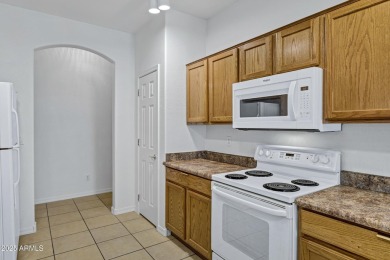 Refreshed 2-bedroom, 2-bathroom home with versatile den on Lone Tree Golf Club in Arizona - for sale on GolfHomes.com, golf home, golf lot