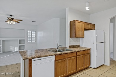 Refreshed 2-bedroom, 2-bathroom home with versatile den on Lone Tree Golf Club in Arizona - for sale on GolfHomes.com, golf home, golf lot