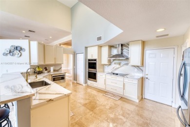 SPECTACULAR WATER VIEWS FROM 5 BED, 4 FULL BATH, POOL WITH on Heron Bay Golf Club in Florida - for sale on GolfHomes.com, golf home, golf lot