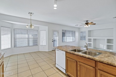 Refreshed 2-bedroom, 2-bathroom home with versatile den on Lone Tree Golf Club in Arizona - for sale on GolfHomes.com, golf home, golf lot