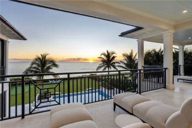 Gated West Indies inspired 5 BD, 2 story smart home with 5.4 BA on Moorings Golf Club in Florida - for sale on GolfHomes.com, golf home, golf lot