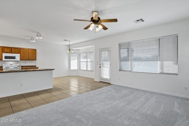 Refreshed 2-bedroom, 2-bathroom home with versatile den on Lone Tree Golf Club in Arizona - for sale on GolfHomes.com, golf home, golf lot