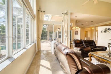 SPECTACULAR WATER VIEWS FROM 5 BED, 4 FULL BATH, POOL WITH on Heron Bay Golf Club in Florida - for sale on GolfHomes.com, golf home, golf lot