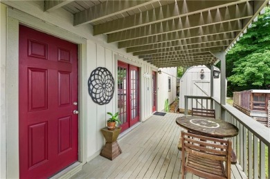 Enjoy stunning views of the Ozarks for miles from the back deck on Holiday Island Golf Course in Arkansas - for sale on GolfHomes.com, golf home, golf lot