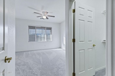 Refreshed 2-bedroom, 2-bathroom home with versatile den on Lone Tree Golf Club in Arizona - for sale on GolfHomes.com, golf home, golf lot