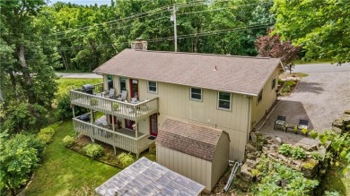 Enjoy stunning views of the Ozarks for miles from the back deck on Holiday Island Golf Course in Arkansas - for sale on GolfHomes.com, golf home, golf lot