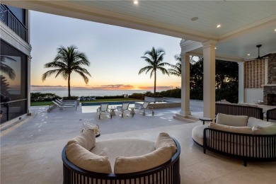 Gated West Indies inspired 5 BD, 2 story smart home with 5.4 BA on Moorings Golf Club in Florida - for sale on GolfHomes.com, golf home, golf lot