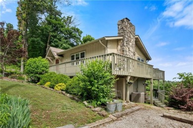 Enjoy stunning views of the Ozarks for miles from the back deck on Holiday Island Golf Course in Arkansas - for sale on GolfHomes.com, golf home, golf lot