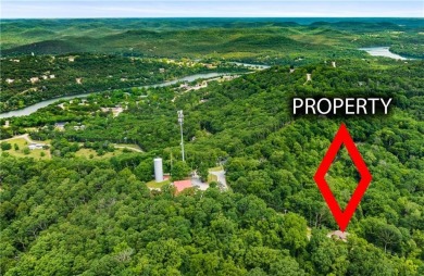 Enjoy stunning views of the Ozarks for miles from the back deck on Holiday Island Golf Course in Arkansas - for sale on GolfHomes.com, golf home, golf lot