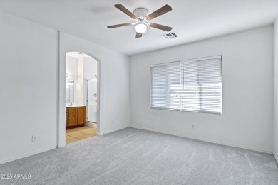 Refreshed 2-bedroom, 2-bathroom home with versatile den on Lone Tree Golf Club in Arizona - for sale on GolfHomes.com, golf home, golf lot
