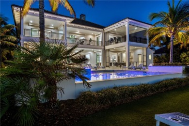 Gated West Indies inspired 5 BD, 2 story smart home with 5.4 BA on Moorings Golf Club in Florida - for sale on GolfHomes.com, golf home, golf lot