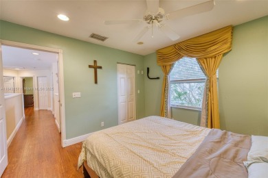 SPECTACULAR WATER VIEWS FROM 5 BED, 4 FULL BATH, POOL WITH on Heron Bay Golf Club in Florida - for sale on GolfHomes.com, golf home, golf lot