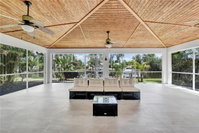 NEVER FLOODED! WOW-FACTOR WATERFRONT! Whole house luxury on Rotonda Golf and Country Club - Long Marsh  in Florida - for sale on GolfHomes.com, golf home, golf lot