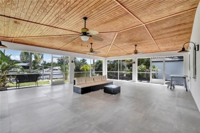 NEVER FLOODED! WOW-FACTOR WATERFRONT! Whole house luxury on Rotonda Golf and Country Club - Long Marsh  in Florida - for sale on GolfHomes.com, golf home, golf lot