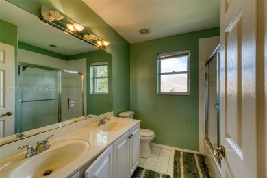 SPECTACULAR WATER VIEWS FROM 5 BED, 4 FULL BATH, POOL WITH on Heron Bay Golf Club in Florida - for sale on GolfHomes.com, golf home, golf lot
