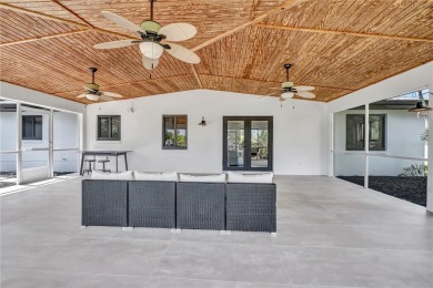 NEVER FLOODED! WOW-FACTOR WATERFRONT! Whole house luxury on Rotonda Golf and Country Club - Long Marsh  in Florida - for sale on GolfHomes.com, golf home, golf lot