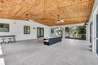 NEVER FLOODED! WOW-FACTOR WATERFRONT! Whole house luxury on Rotonda Golf and Country Club - Long Marsh  in Florida - for sale on GolfHomes.com, golf home, golf lot