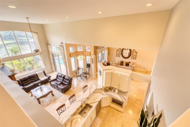 SPECTACULAR WATER VIEWS FROM 5 BED, 4 FULL BATH, POOL WITH on Heron Bay Golf Club in Florida - for sale on GolfHomes.com, golf home, golf lot