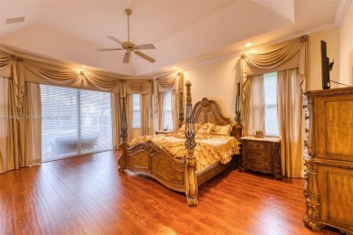 SPECTACULAR WATER VIEWS FROM 5 BED, 4 FULL BATH, POOL WITH on Heron Bay Golf Club in Florida - for sale on GolfHomes.com, golf home, golf lot