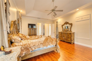 SPECTACULAR WATER VIEWS FROM 5 BED, 4 FULL BATH, POOL WITH on Heron Bay Golf Club in Florida - for sale on GolfHomes.com, golf home, golf lot