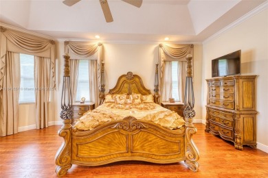SPECTACULAR WATER VIEWS FROM 5 BED, 4 FULL BATH, POOL WITH on Heron Bay Golf Club in Florida - for sale on GolfHomes.com, golf home, golf lot