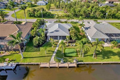 NEVER FLOODED! WOW-FACTOR WATERFRONT! Whole house luxury on Rotonda Golf and Country Club - Long Marsh  in Florida - for sale on GolfHomes.com, golf home, golf lot