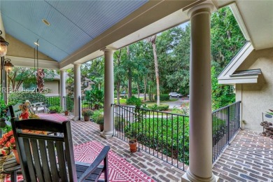 Welcome to a bright and inviting Lowcountry-style home in the on Long Cove Club in South Carolina - for sale on GolfHomes.com, golf home, golf lot