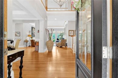 Welcome to a bright and inviting Lowcountry-style home in the on Long Cove Club in South Carolina - for sale on GolfHomes.com, golf home, golf lot
