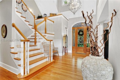 Welcome to a bright and inviting Lowcountry-style home in the on Long Cove Club in South Carolina - for sale on GolfHomes.com, golf home, golf lot