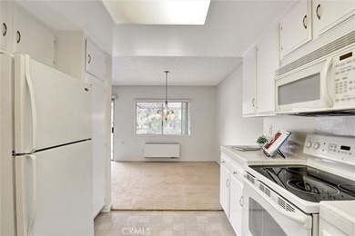 Nestled in the beautifully landscaped, gate-guarded 55+ on Leisure Village Par 3 Golf Course in California - for sale on GolfHomes.com, golf home, golf lot