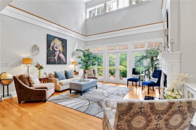 Welcome to a bright and inviting Lowcountry-style home in the on Long Cove Club in South Carolina - for sale on GolfHomes.com, golf home, golf lot