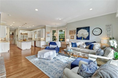 Welcome to a bright and inviting Lowcountry-style home in the on Long Cove Club in South Carolina - for sale on GolfHomes.com, golf home, golf lot