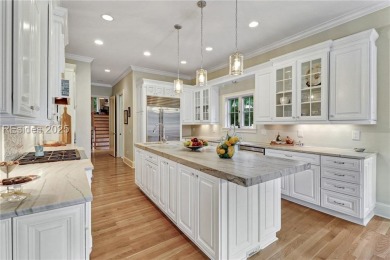 Welcome to a bright and inviting Lowcountry-style home in the on Long Cove Club in South Carolina - for sale on GolfHomes.com, golf home, golf lot