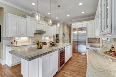 Welcome to a bright and inviting Lowcountry-style home in the on Long Cove Club in South Carolina - for sale on GolfHomes.com, golf home, golf lot