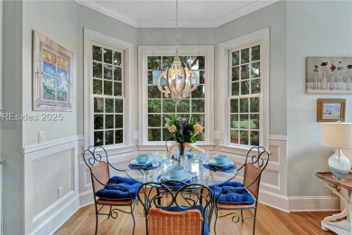 Welcome to a bright and inviting Lowcountry-style home in the on Long Cove Club in South Carolina - for sale on GolfHomes.com, golf home, golf lot