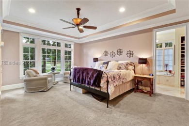 Welcome to a bright and inviting Lowcountry-style home in the on Long Cove Club in South Carolina - for sale on GolfHomes.com, golf home, golf lot