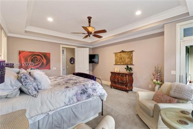 Welcome to a bright and inviting Lowcountry-style home in the on Long Cove Club in South Carolina - for sale on GolfHomes.com, golf home, golf lot