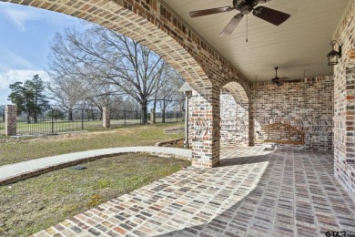 This gorgeous craftsman style home is ready for you to move on Mount Pleasant Country Club in Texas - for sale on GolfHomes.com, golf home, golf lot