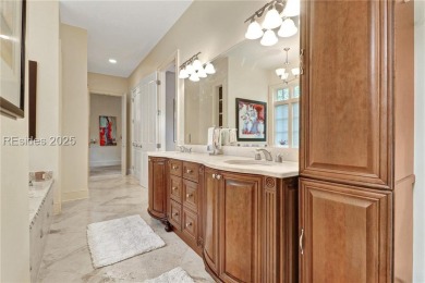 Welcome to a bright and inviting Lowcountry-style home in the on Long Cove Club in South Carolina - for sale on GolfHomes.com, golf home, golf lot