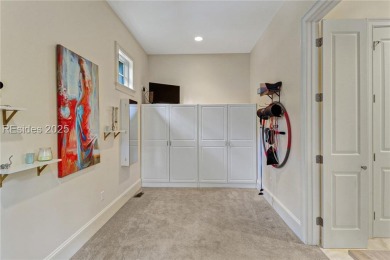 Welcome to a bright and inviting Lowcountry-style home in the on Long Cove Club in South Carolina - for sale on GolfHomes.com, golf home, golf lot