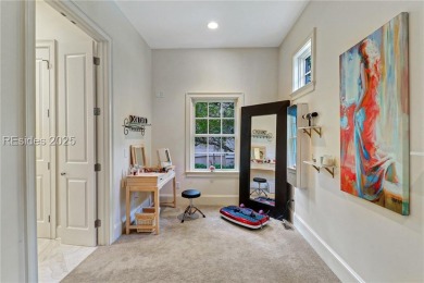 Welcome to a bright and inviting Lowcountry-style home in the on Long Cove Club in South Carolina - for sale on GolfHomes.com, golf home, golf lot