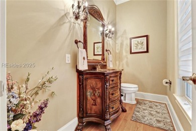 Welcome to a bright and inviting Lowcountry-style home in the on Long Cove Club in South Carolina - for sale on GolfHomes.com, golf home, golf lot